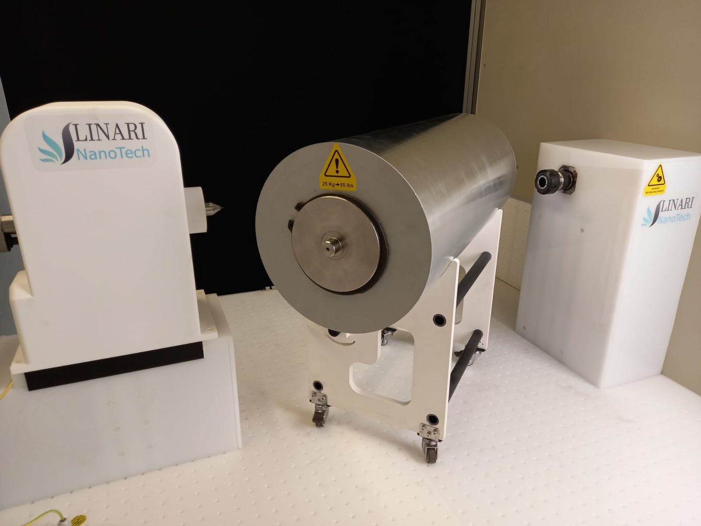 Removable drum collector of the Pure Spinner on its wheeled cradle, extracted without touching the nanofibers