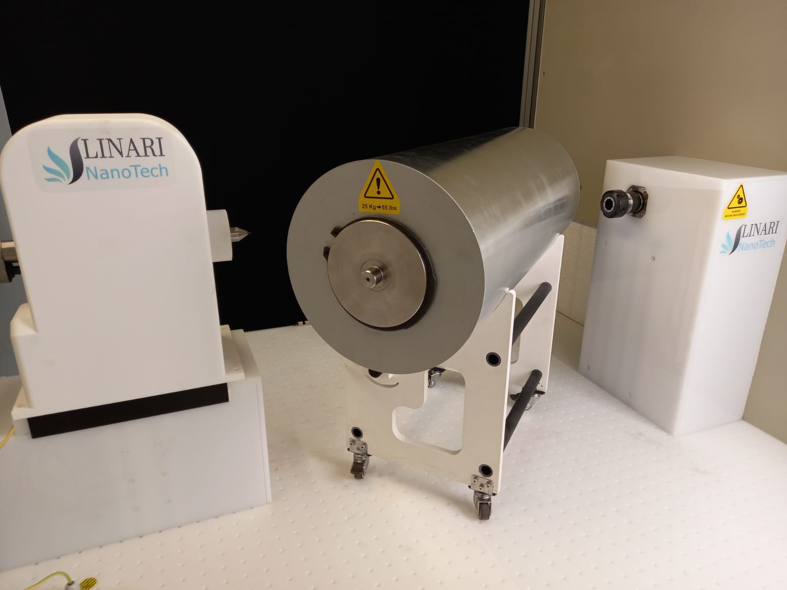 Removable drum collector of the Pure Spinner on its wheeled cradle, extracted without touching the nanofibers