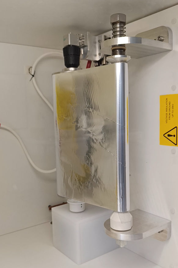 A roll-to-roll module detail inside all-in-one electrospinning machine from Linari Nanotech. Alluminum foil installed.