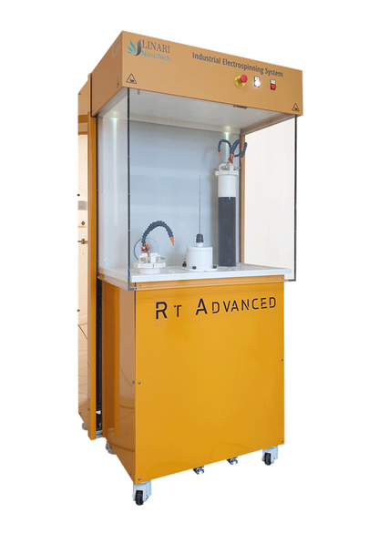 RT Advanced industrial electrospinning system from Linari Nanotech with two high voltage generators and thin drum collector in the center.
